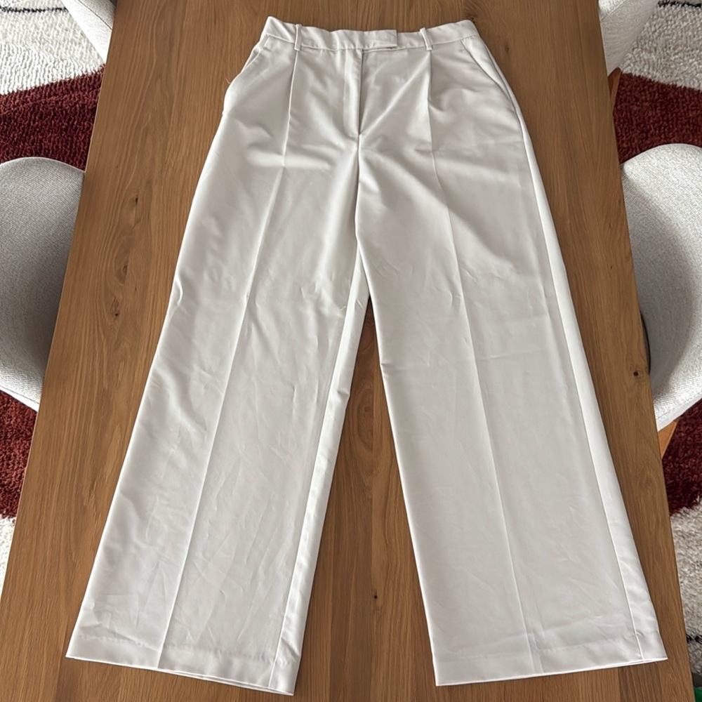 Tan Zara pleated slacks size XL (fit ~ size 10), worn, stitching is not perfect